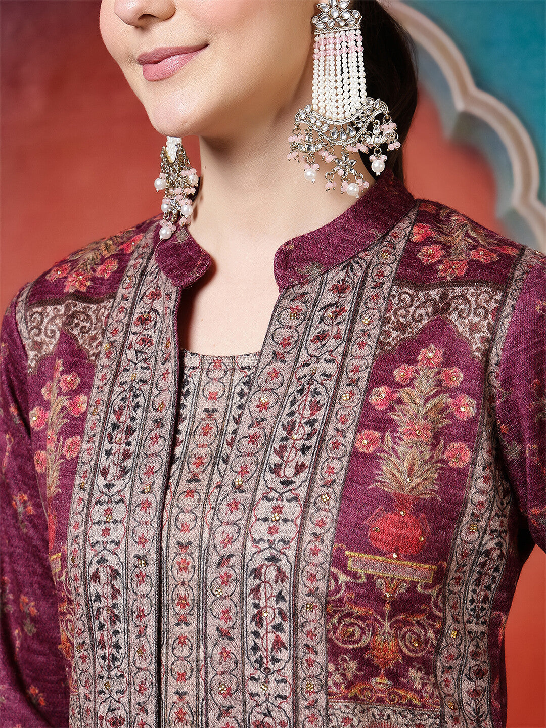 Floral Embroidered A-Line Winter Wear Kurta & Trousers Sets