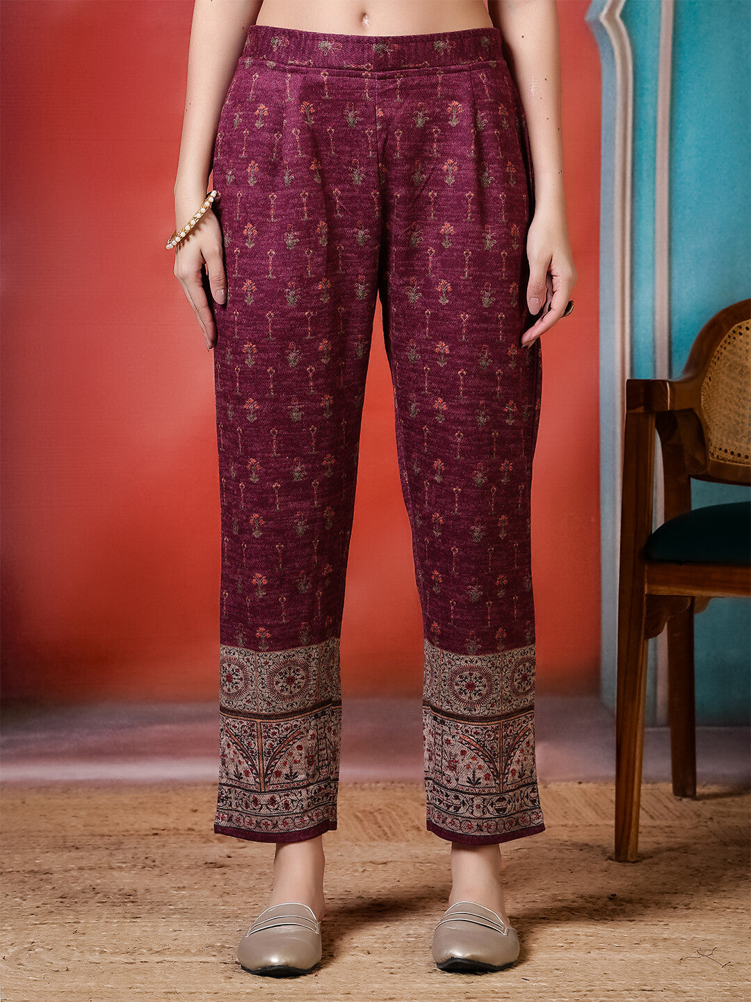 Floral Embroidered A-Line Winter Wear Kurta & Trousers Sets