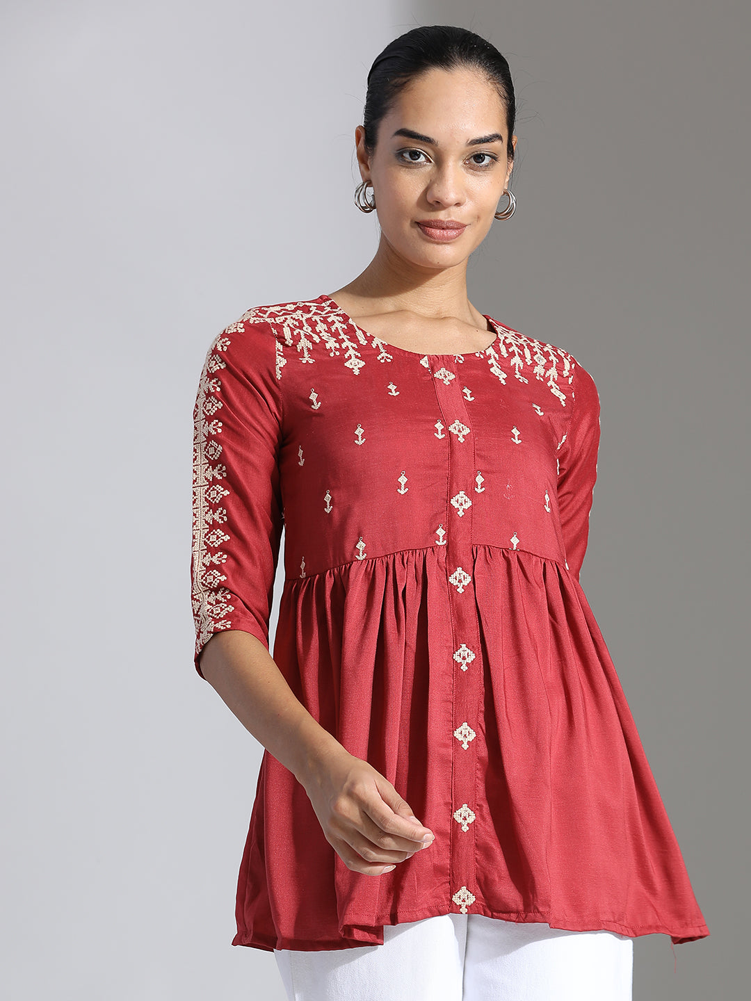 Rust Embroidered Party Wear Peplum Top