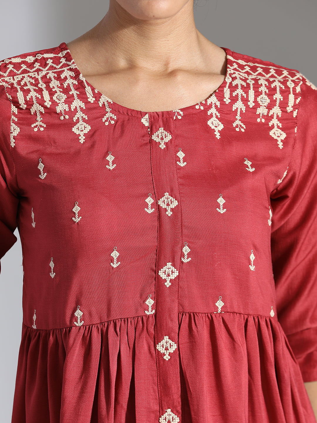 Rust Embroidered Party Wear Peplum Top