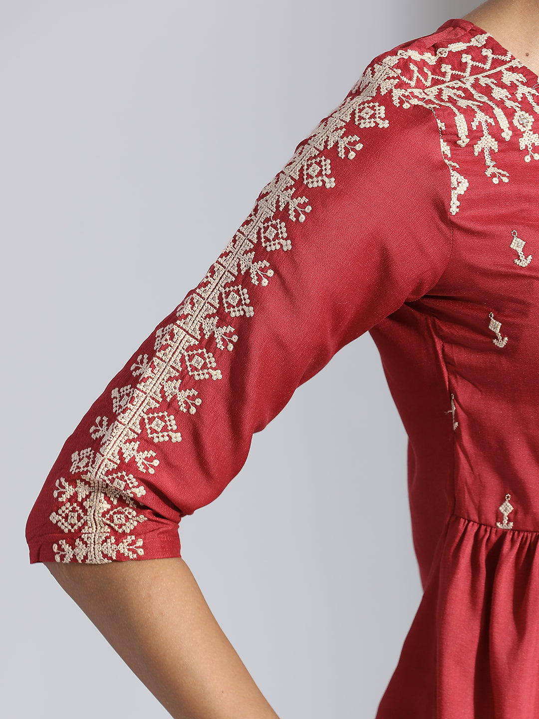 Rust Embroidered Party Wear Peplum Top