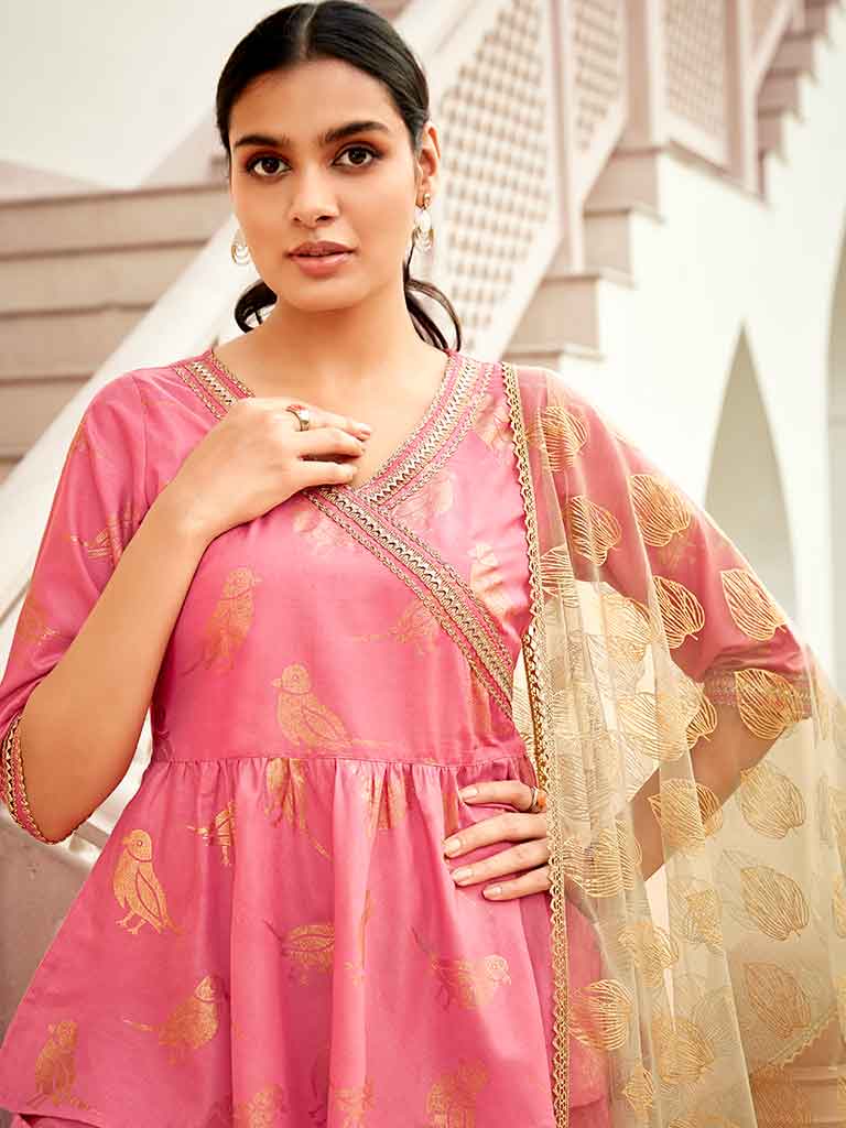 Peach Color Bird Printed Silk Blend Peplum Top And Skirt With A Gold Print Net Dupatta