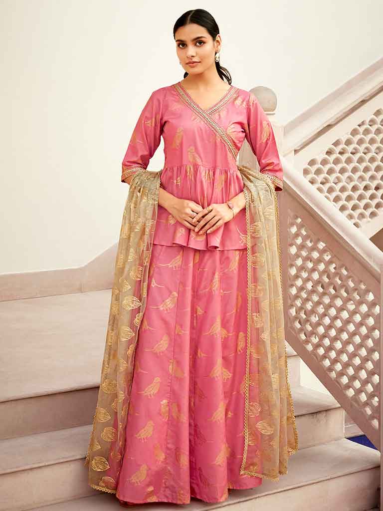 Peach Color Bird Printed Silk Blend Peplum Top And Skirt With A Gold Print Net Dupatta