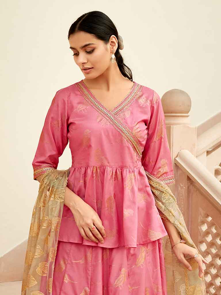Peach Color Bird Printed Silk Blend Peplum Top And Skirt With A Gold Print Net Dupatta