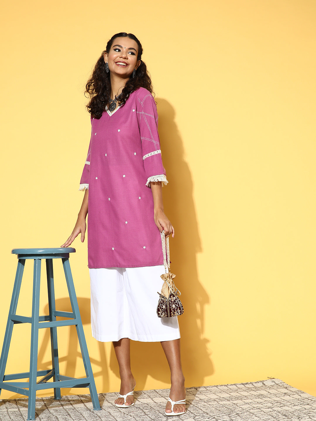 Magenta Cotton Blend Mirror Work Straight Short Kurta Has V-Neckline, Front Panel Has Mirror Work All Over, Three Fourth Sleeves Has Mirror Work And Crochet Lace At Hem, Side Slit Straight Short Kurta