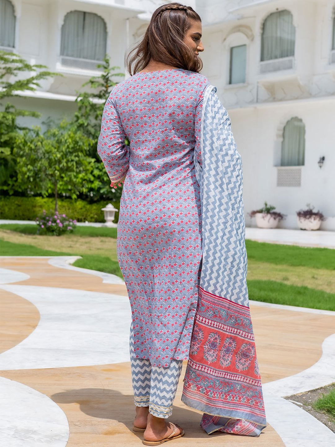 A Straight Ethnic Printed Mirror Work Kurta With Printed Pants And Dupatta