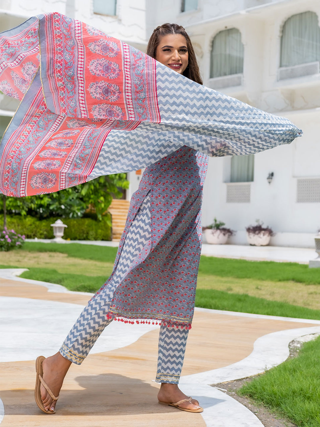 A Straight Ethnic Printed Mirror Work Kurta With Printed Pants And Dupatta