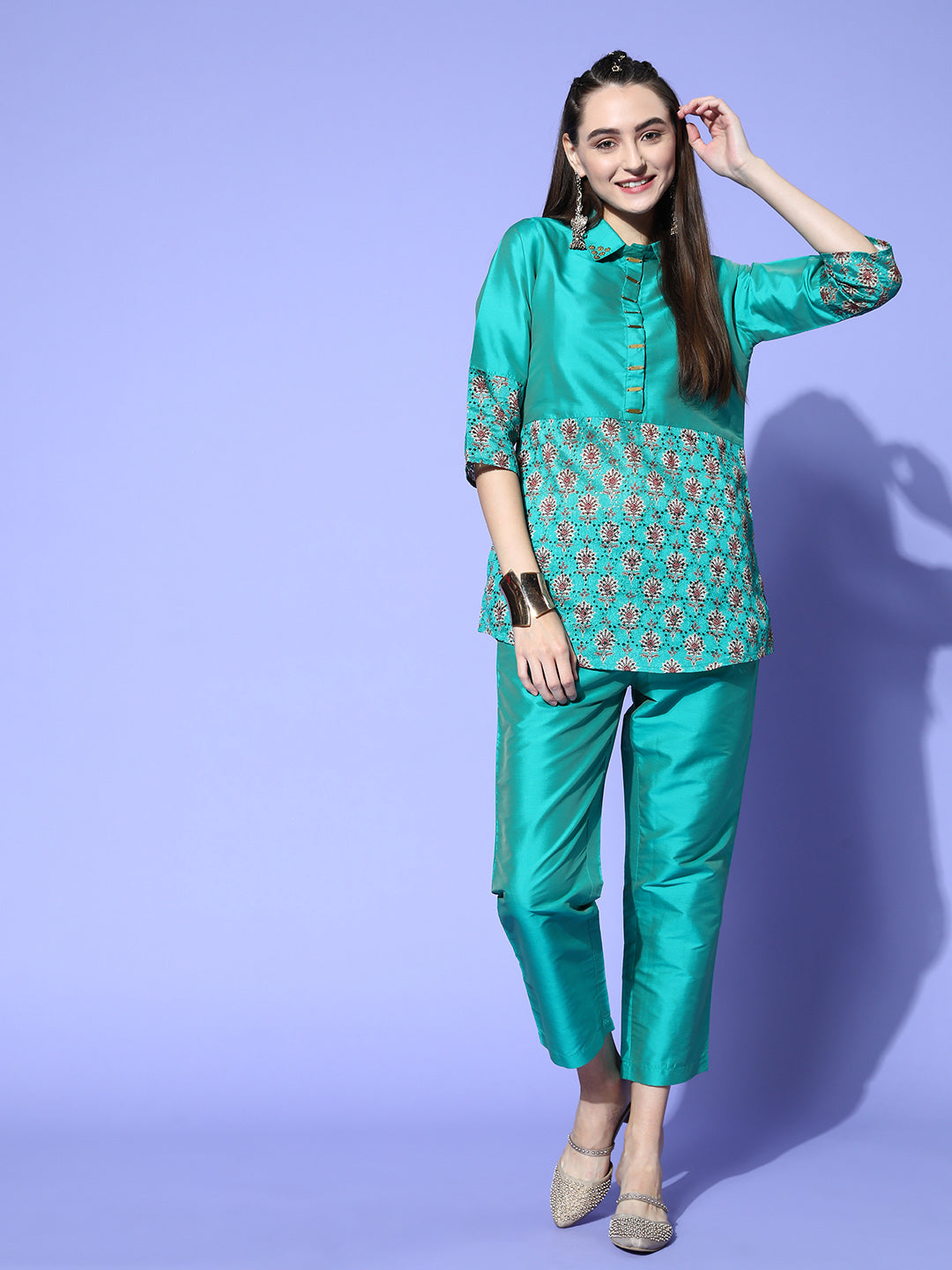 A Teal Color Silk And Shifili Embellished Shirt Paired With Solid Silk Trousers