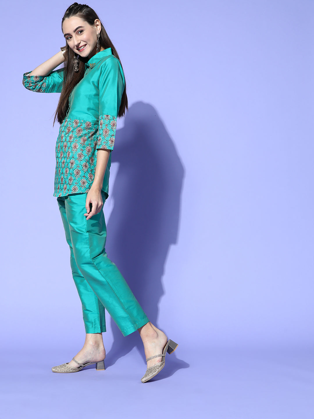 A Teal Color Silk And Shifili Embellished Shirt Paired With Solid Silk Trousers