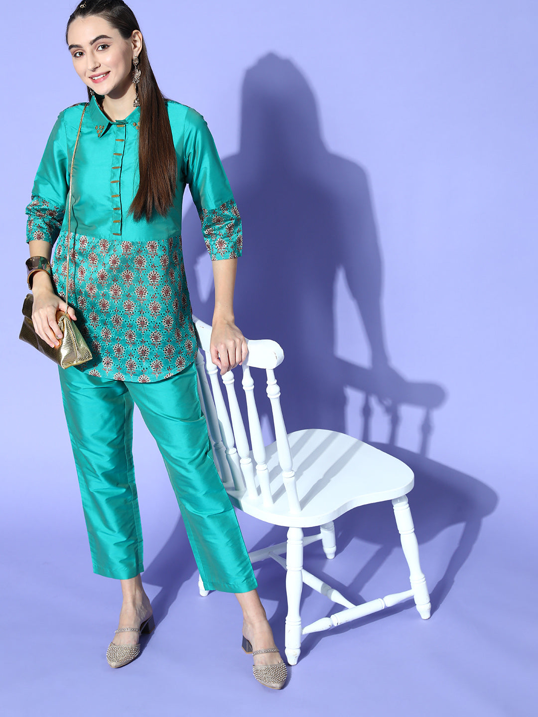 A Teal Color Silk And Shifili Embellished Shirt Paired With Solid Silk Trousers