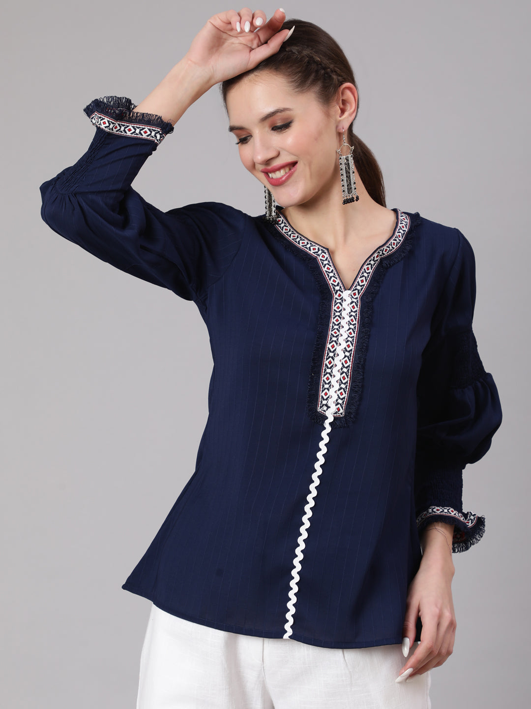 A Blue Silk Blend Lace Embellished Top With Smocked Sleeves With Wide-Leg White Pants