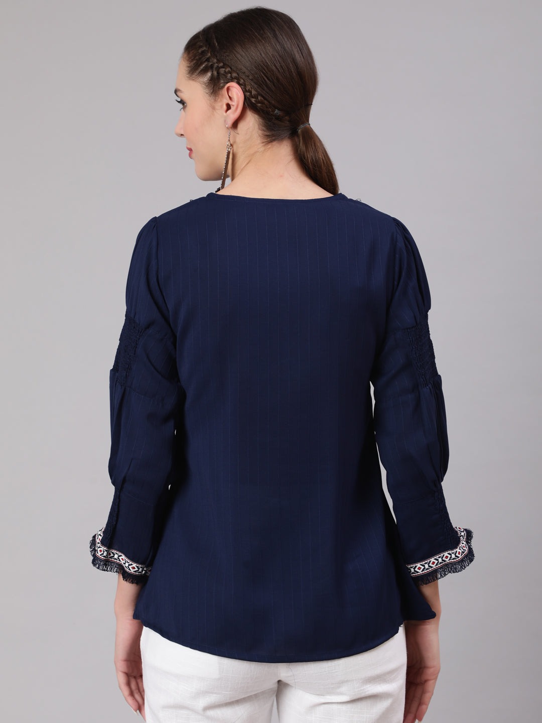 A Blue Silk Blend Lace Embellished Top With Smocked Sleeves With Wide-Leg White Pants