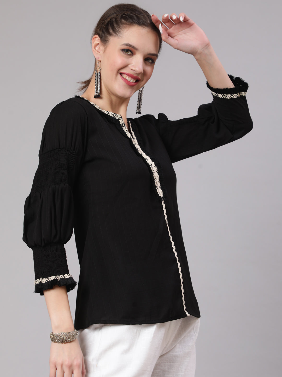 A Black Poly Silk Lace Embellished Top With Smocked Sleeves With Wide-Leg White Pants