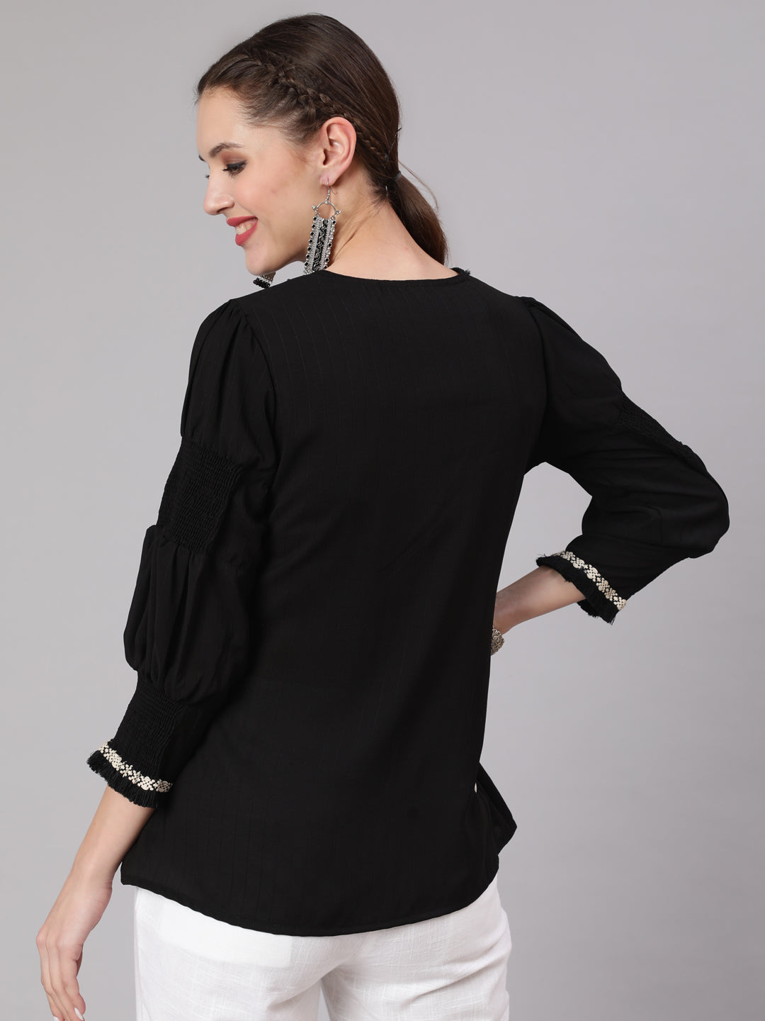 A Black Poly Silk Lace Embellished Top With Smocked Sleeves With Wide-Leg White Pants