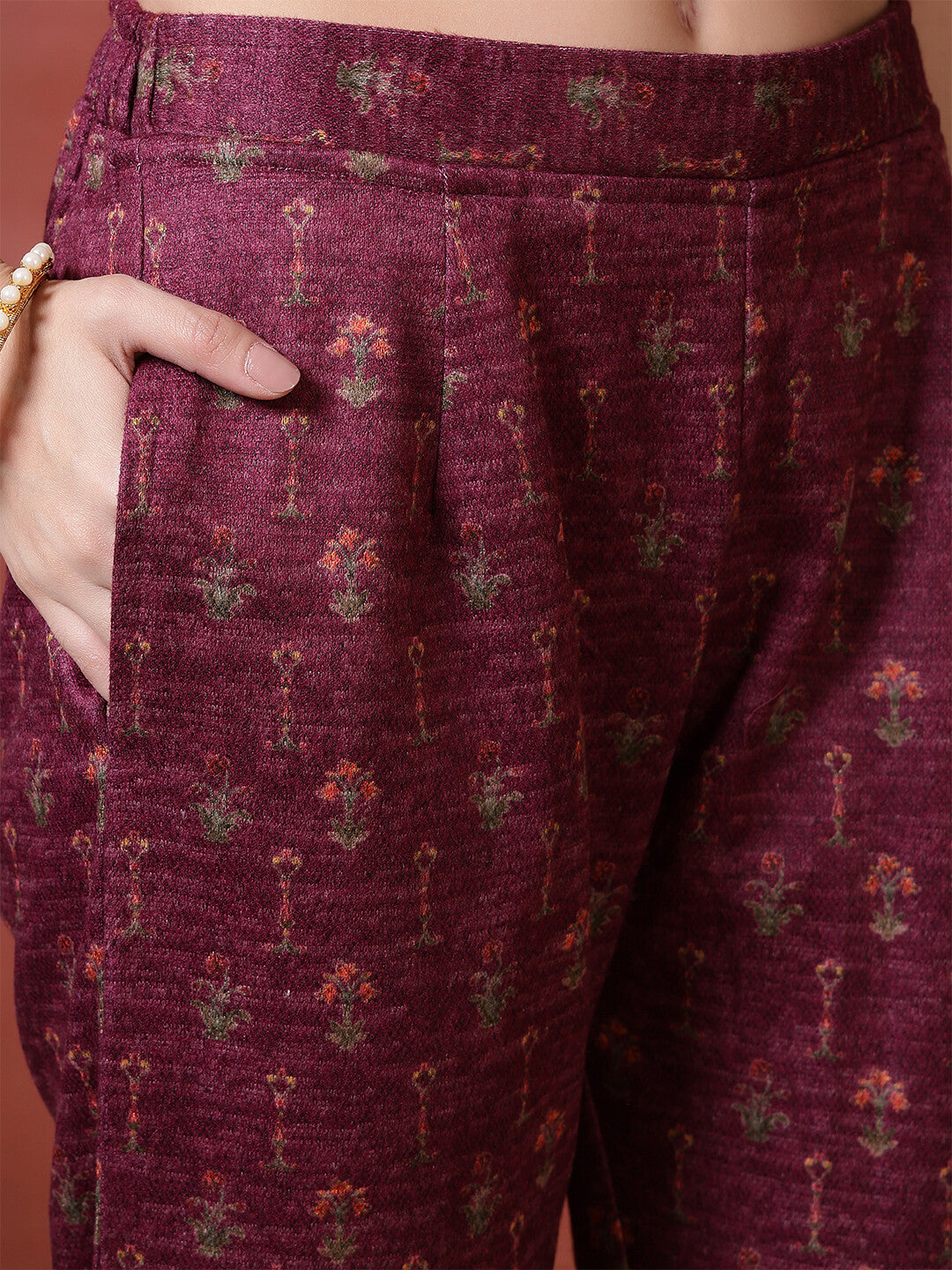 Floral Embroidered A-Line Winter Wear Kurta & Trousers Sets