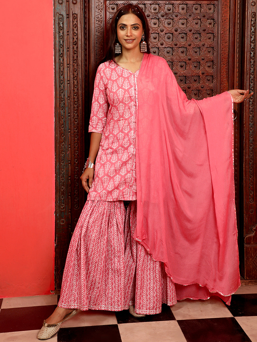 Pink Solid Kurta with Sharara and Net Dupatta
