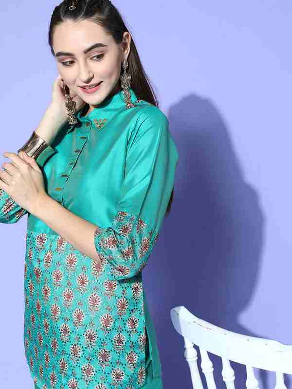 A Teal Color Silk And Shifili Embellished Shirt Paired With Solid Silk Trousers