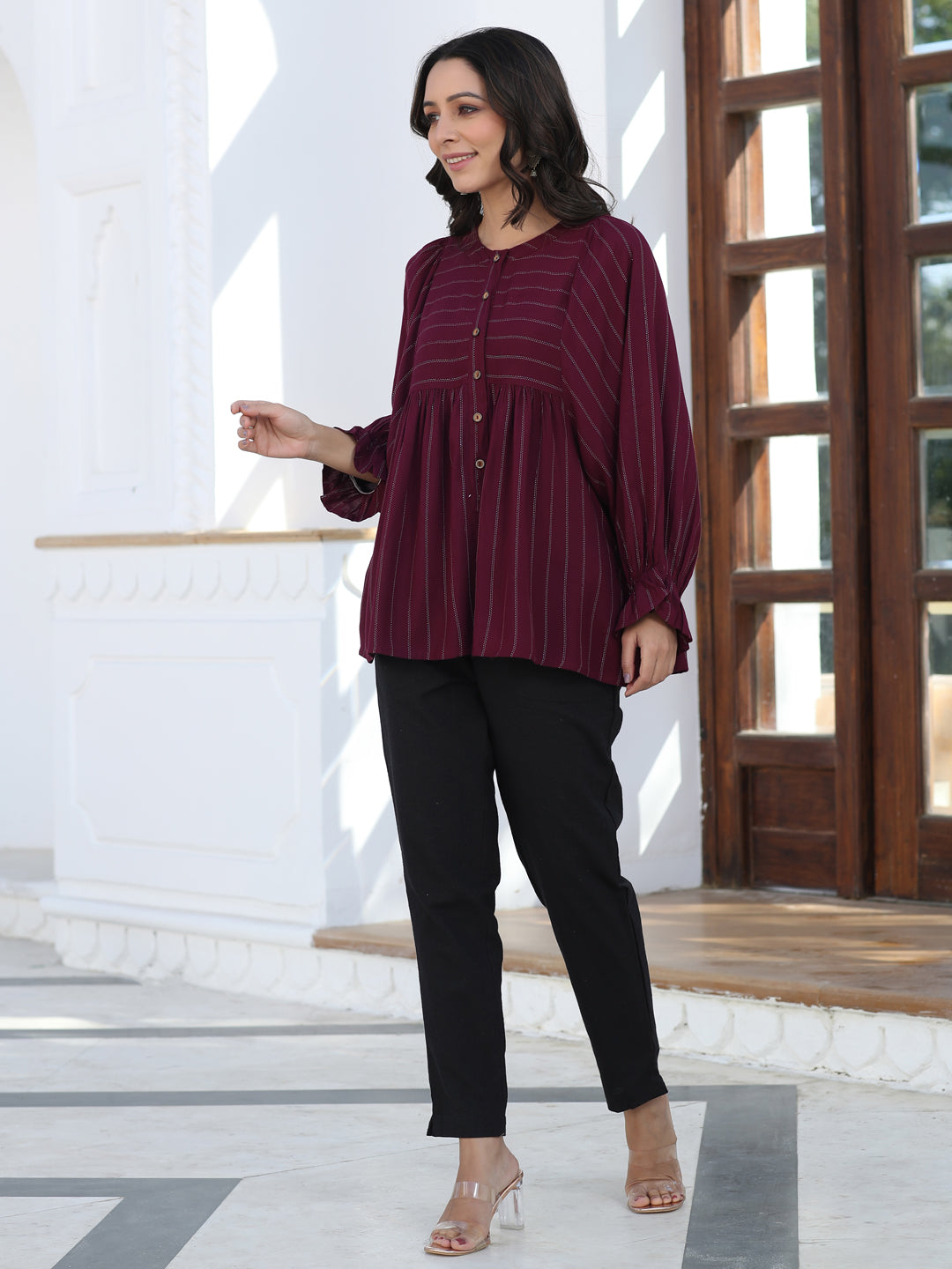 A Maroon Self Weave Rayon Lurex Gathered Top With Elasticated Gathered Sleeves With Black Pants