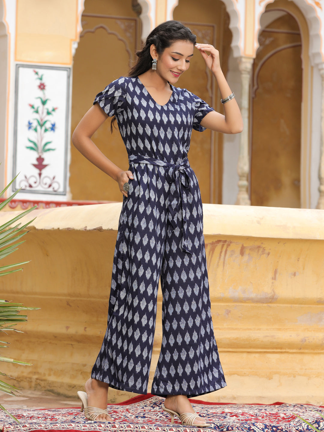 Jumpsuit with designer belt at best price