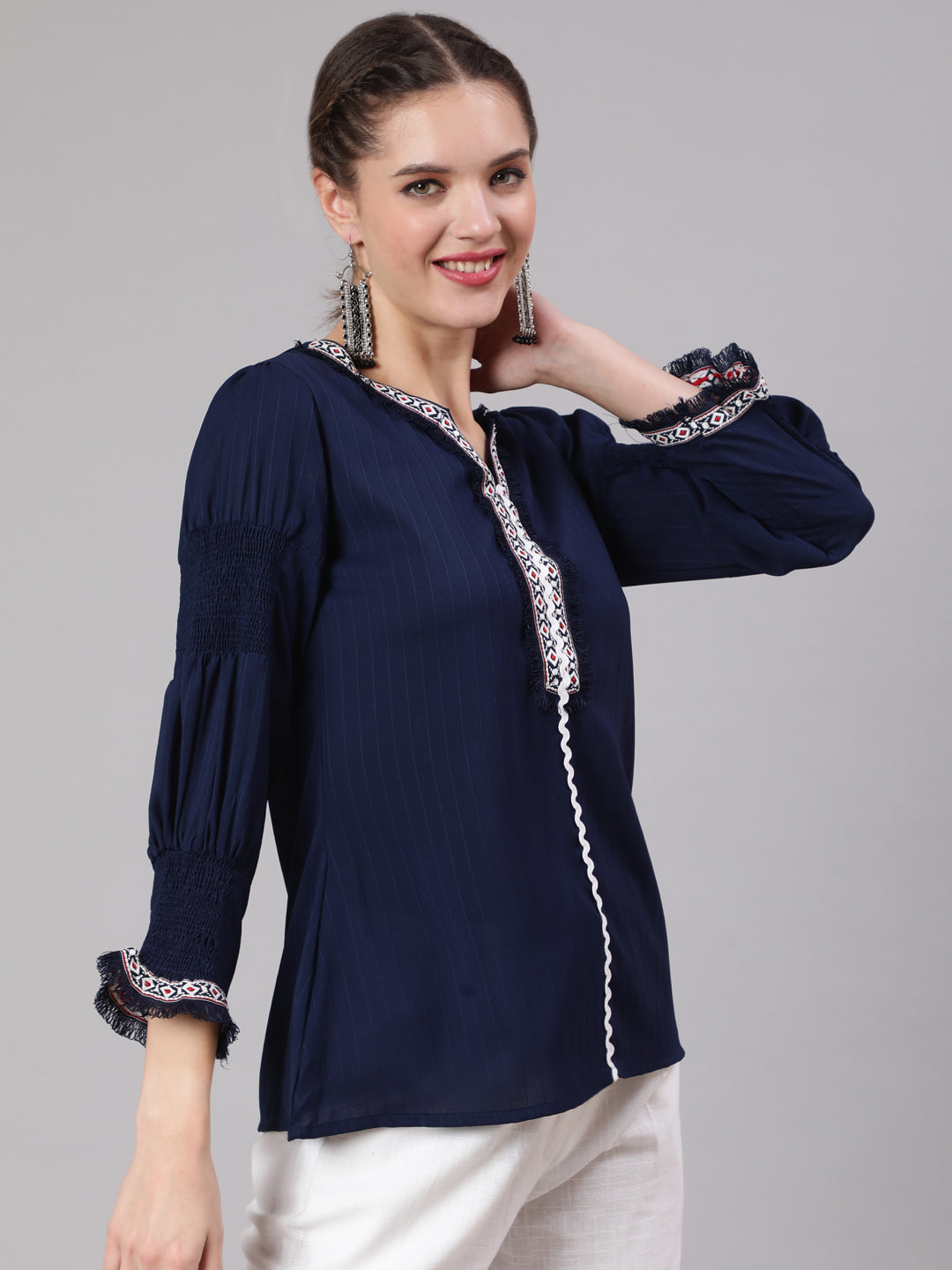 A Blue Silk Blend Lace Embellished Top With Smocked Sleeves With Wide-Leg White Pants