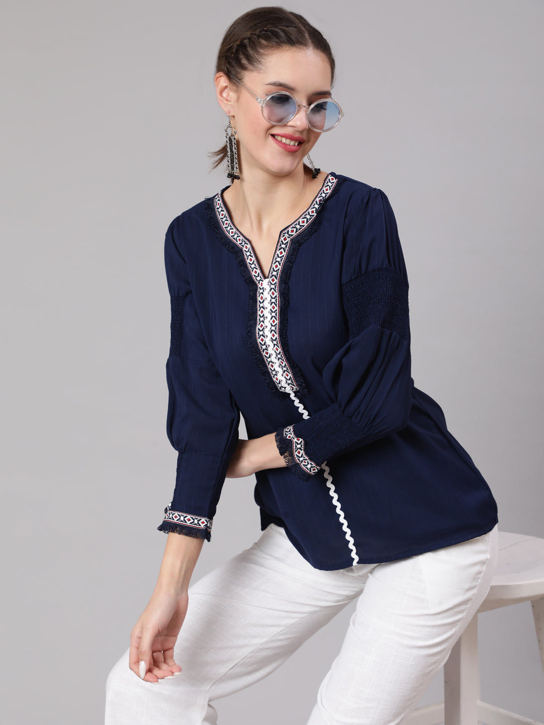 A Blue Silk Blend Lace Embellished Top With Smocked Sleeves With Wide-Leg White Pants